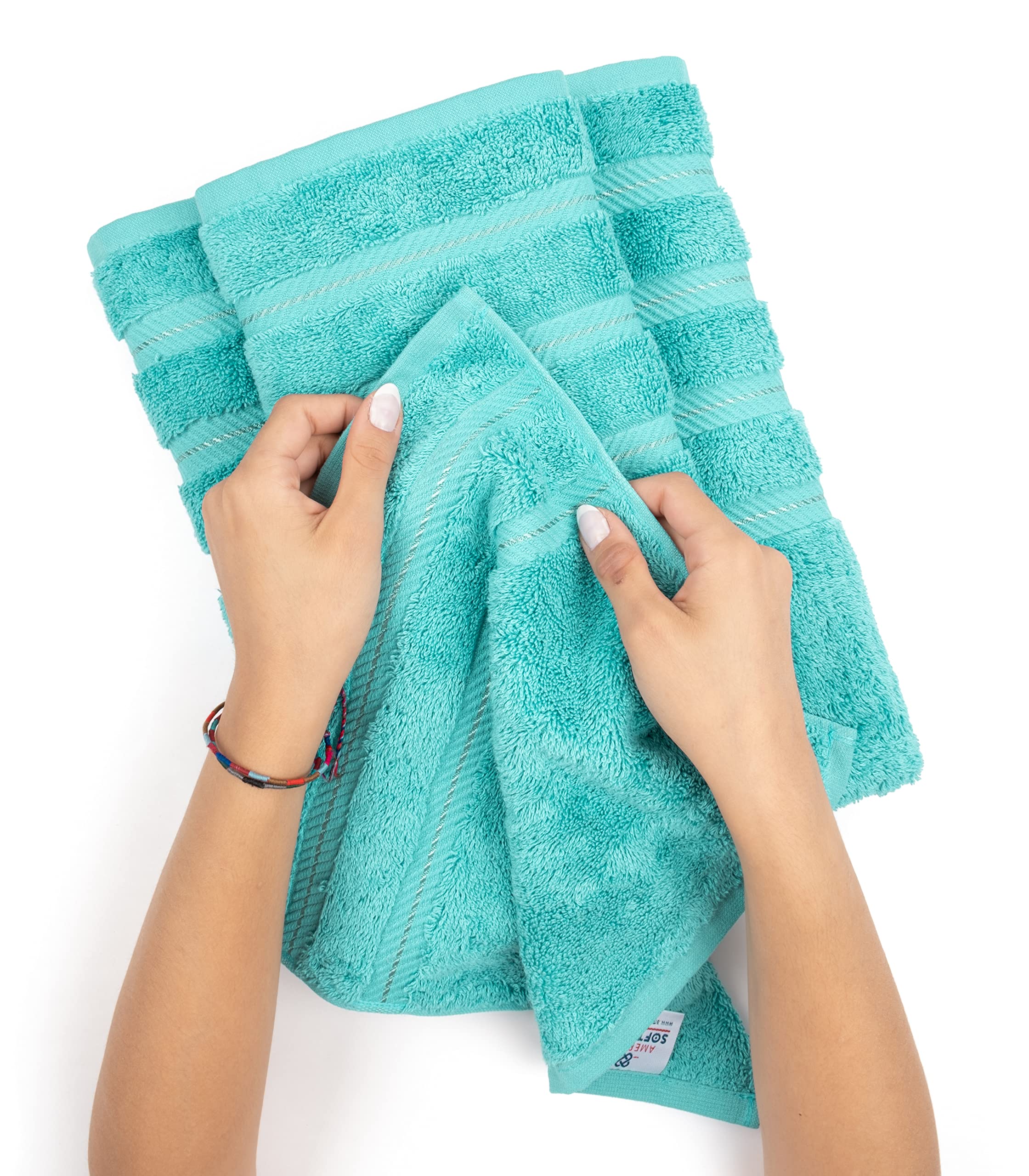 American Soft Linen towel next to ruler for scale to show 27x54 inch size clarity