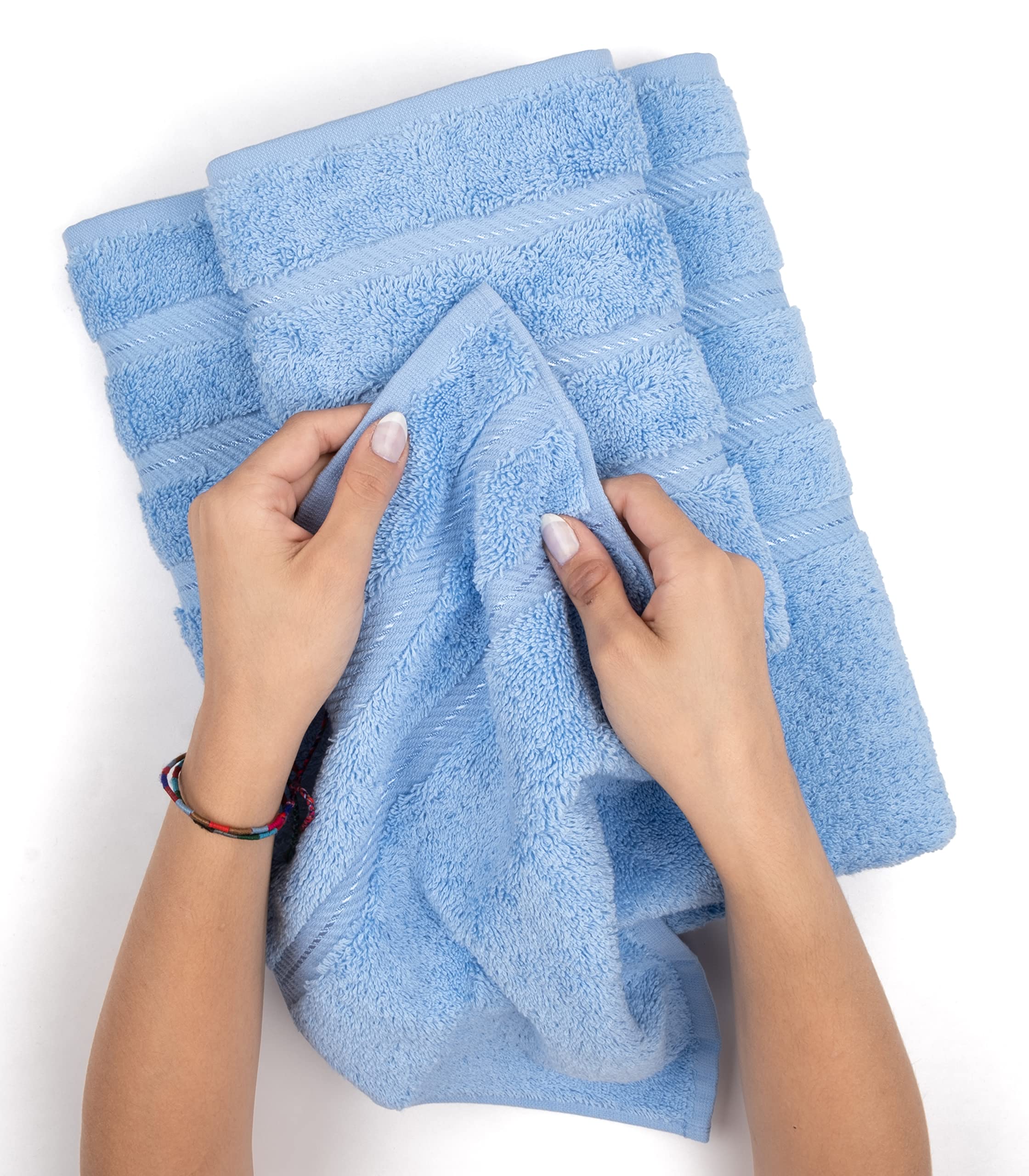 American Soft Linen towels beside ruler illustrating accurate size dimensions