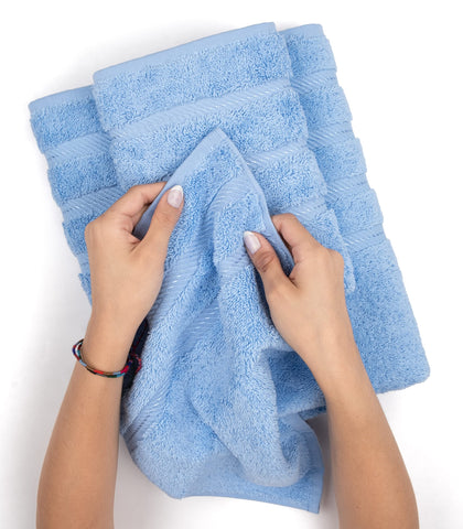 American Soft Linen towels beside ruler illustrating accurate size dimensions