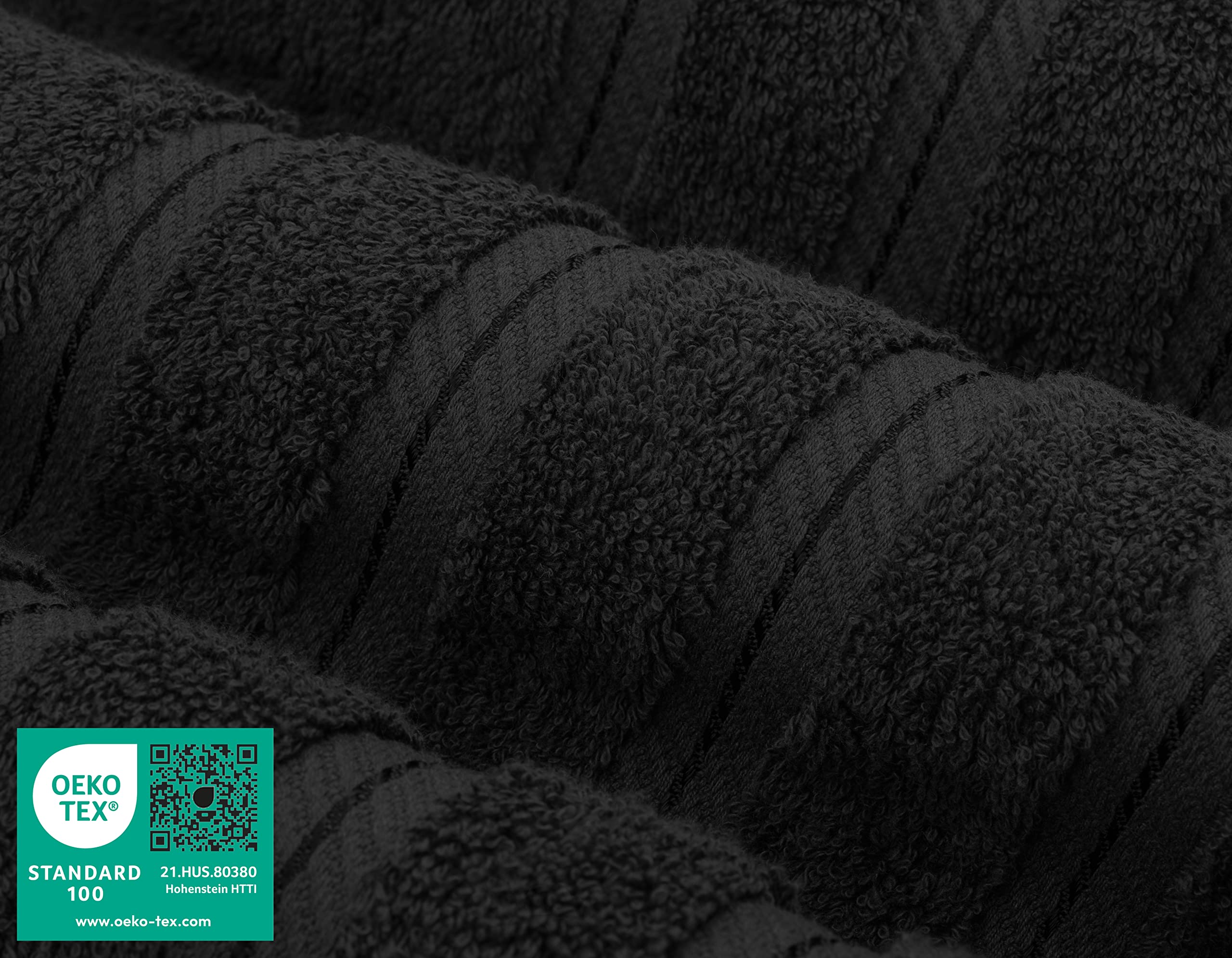 American Soft Linen towel held in hand demonstrating softness and size