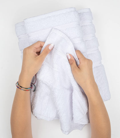 American Soft Linen stacked washcloths demonstrating compact storage and softness