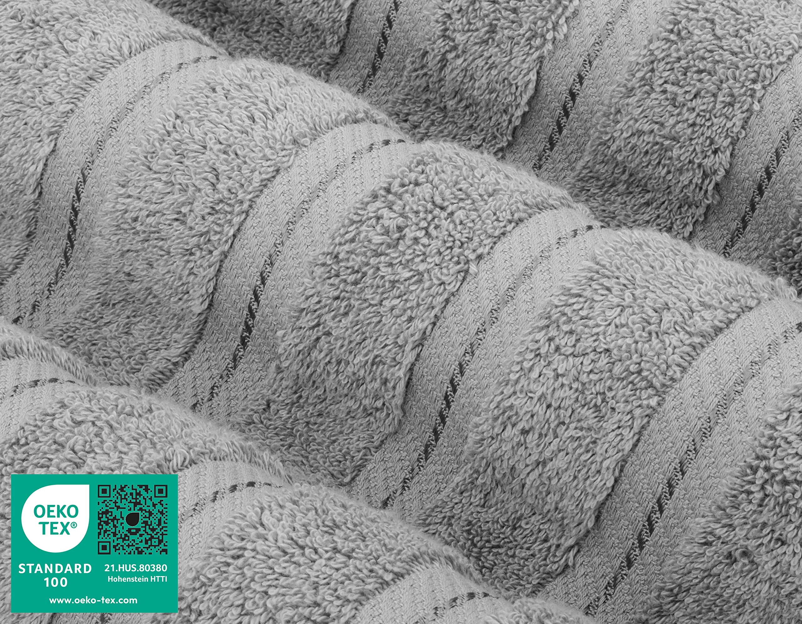 American Soft Linen folded towels stacked to show thickness and neat storage