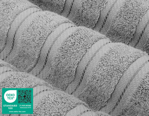 American Soft Linen folded towels stacked to show thickness and neat storage