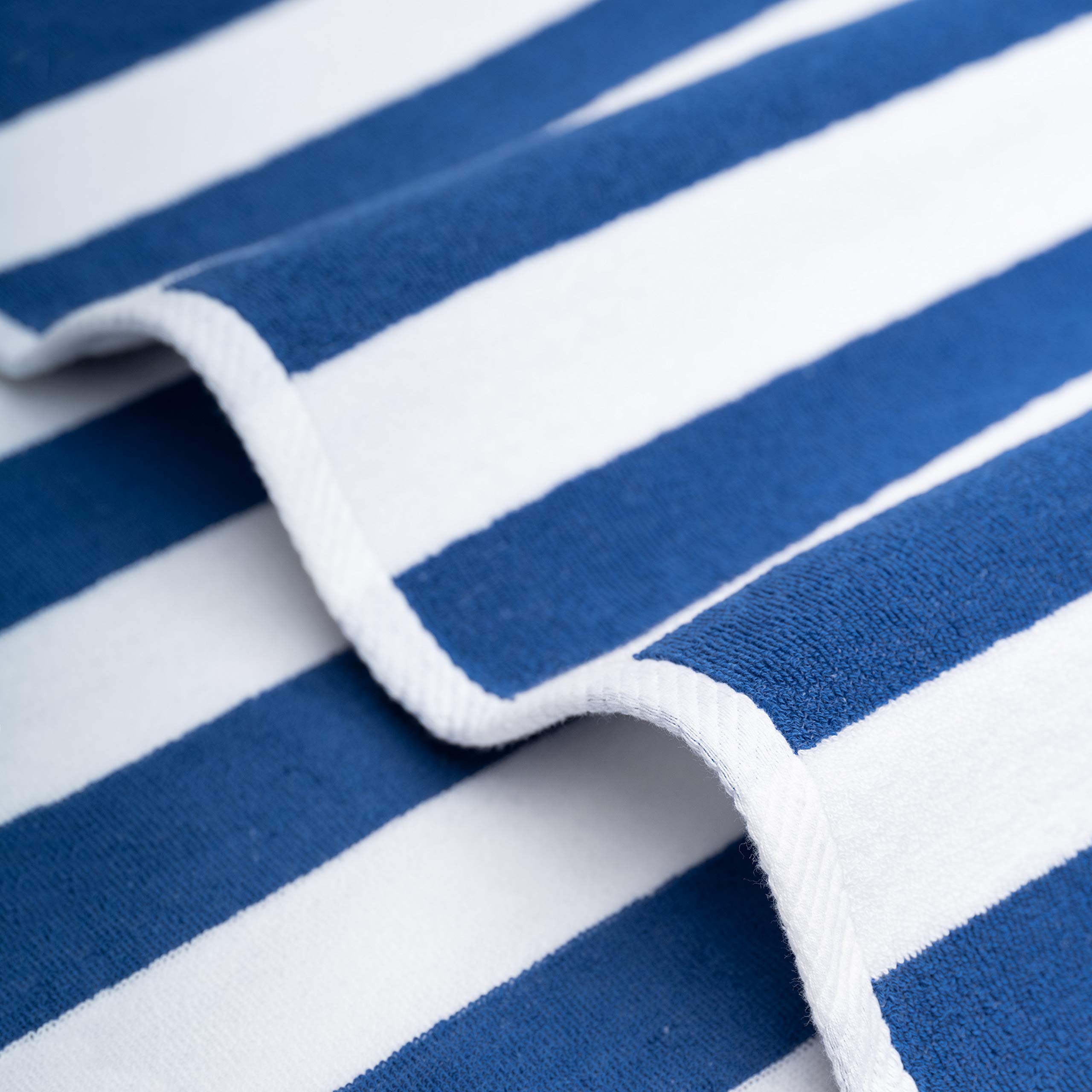 American Soft Linen towel draped on lounge chair offering comfortable coverage