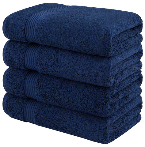 american veteran towel size comparison folded next to shower illustrating scale and thickness