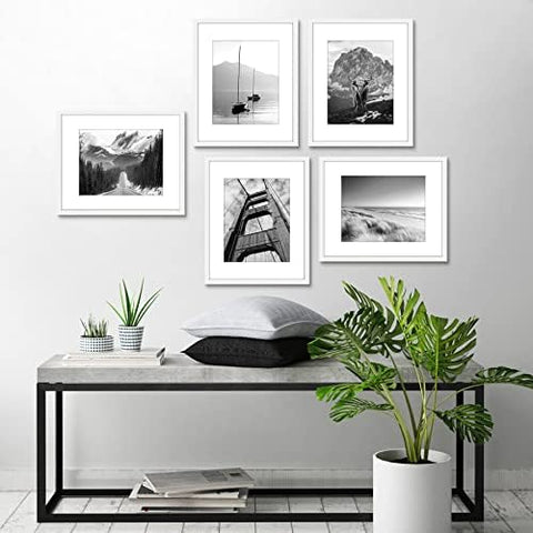 Americanflat gallery wall with multiple frames creating cohesive decor impact