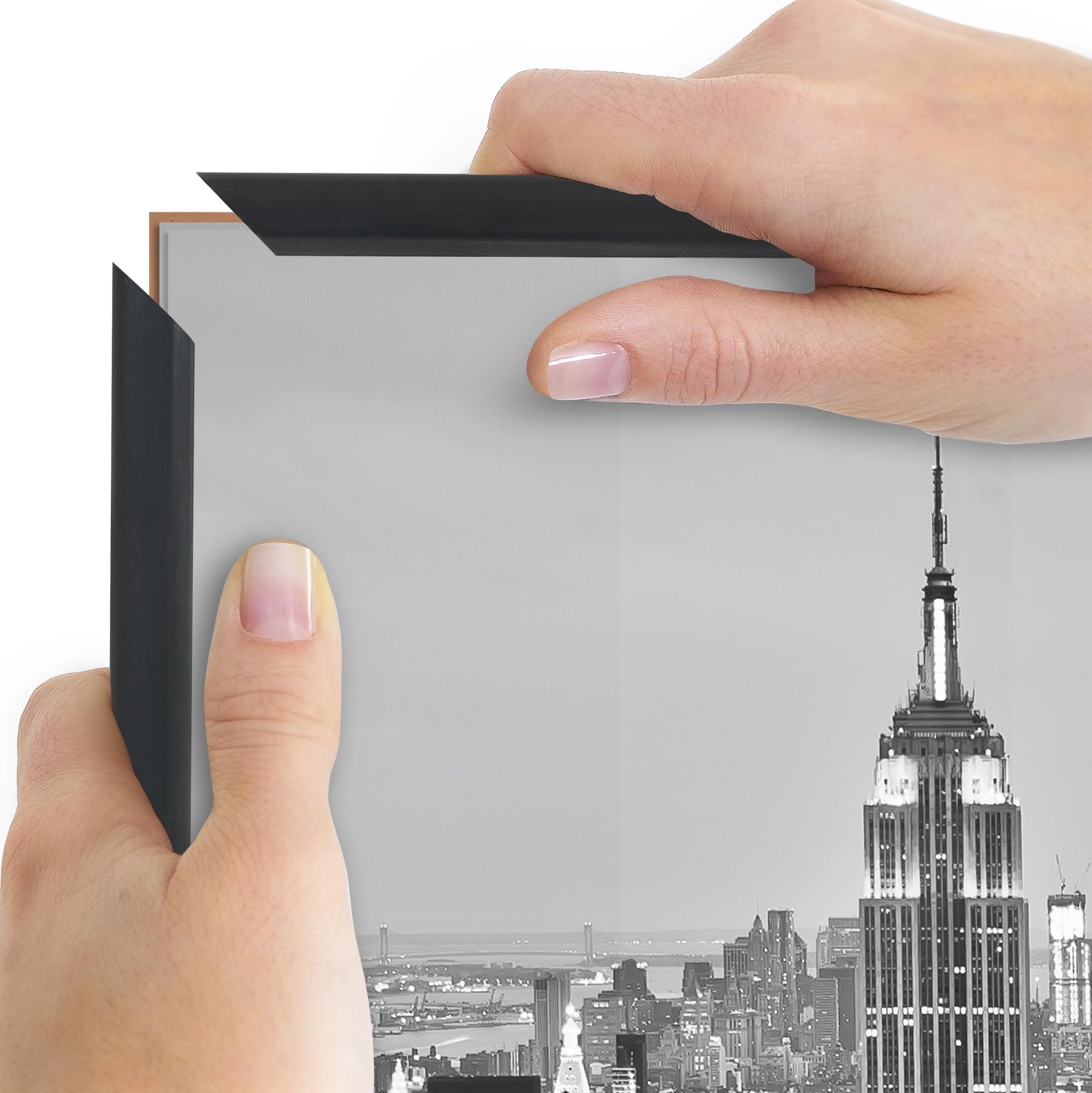 Americanflat frame held in hand showing lightweight design and easy handling benefit