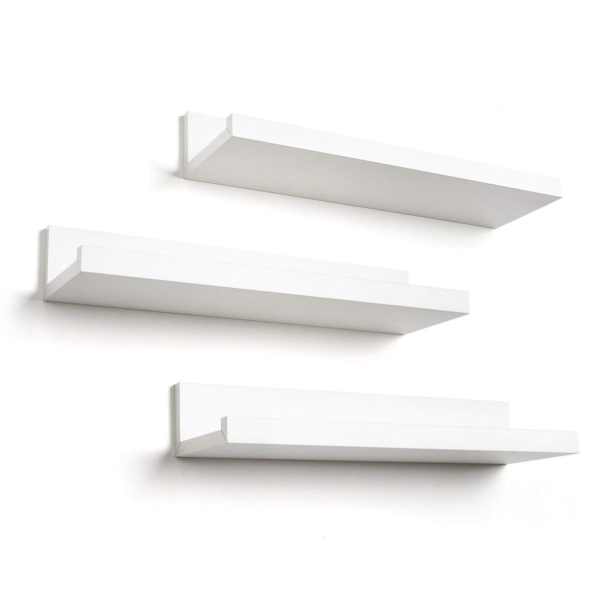 Americanflat front view of three white floating shelves showing clean modern storage