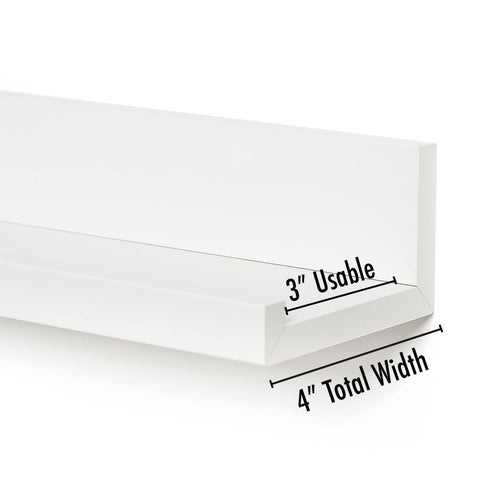Americanflat shelves styled in a bedroom displaying photos and small plants