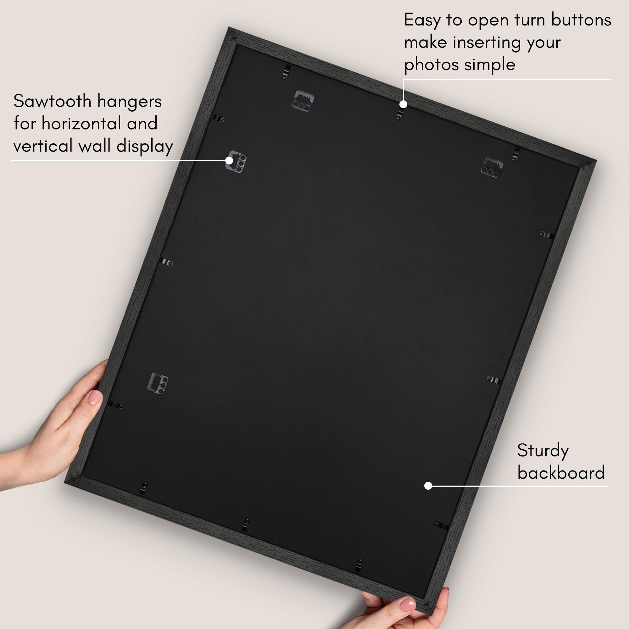 Americanflat frame beside hand for scale illustrating lightweight, easy-to-hang benefit