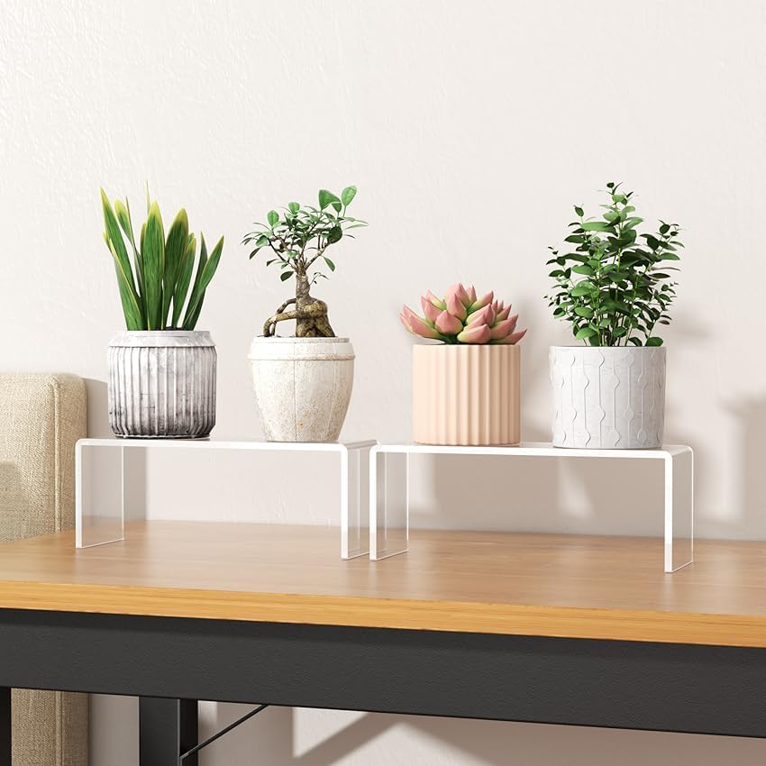 Aminigram riser holding office supplies on desk creating neat, reachable layout