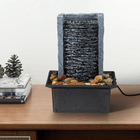 AMOOTEK fountain on bathroom shelf presenting stylish accent and space-saving design
