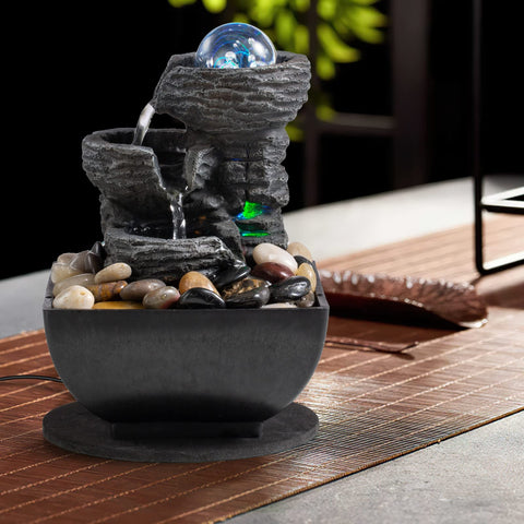 AMOOTEK LED-lit fountain at night creating soothing ambient light benefit