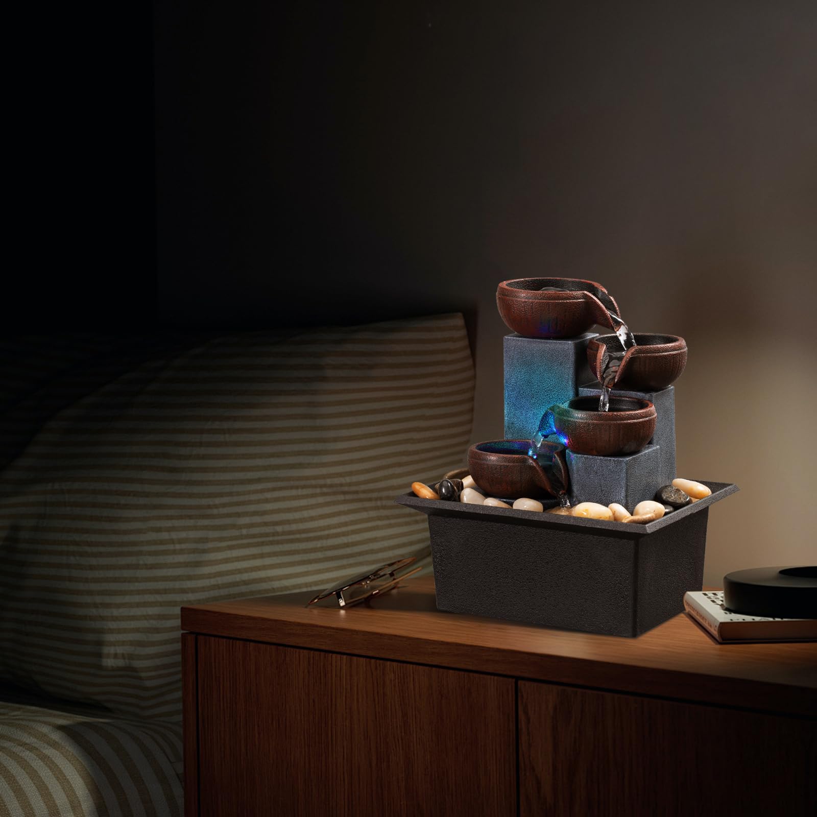 AMOOTEK next to a book to show size and desk-friendly scale