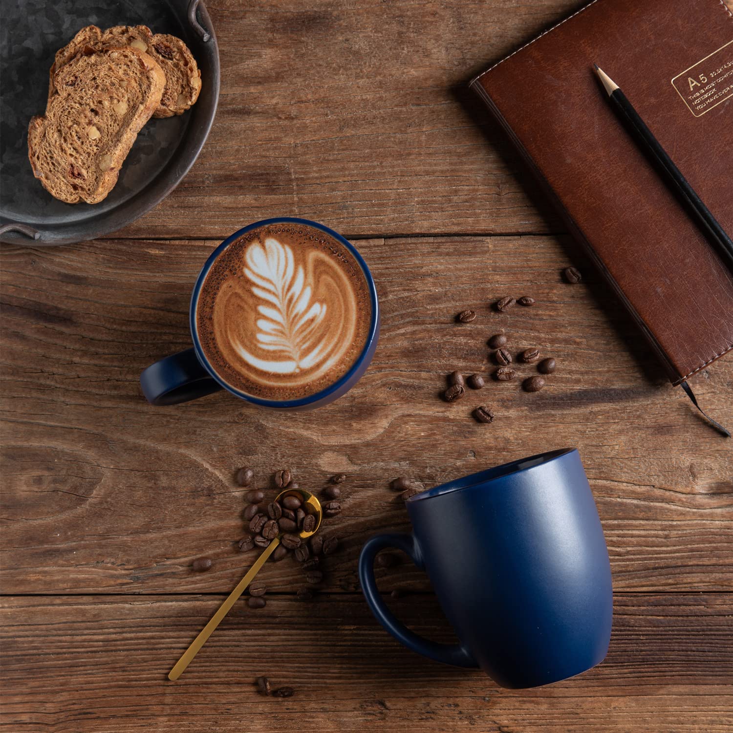 AmorArc mug in use with coffee pour demonstrating large 16 oz capacity