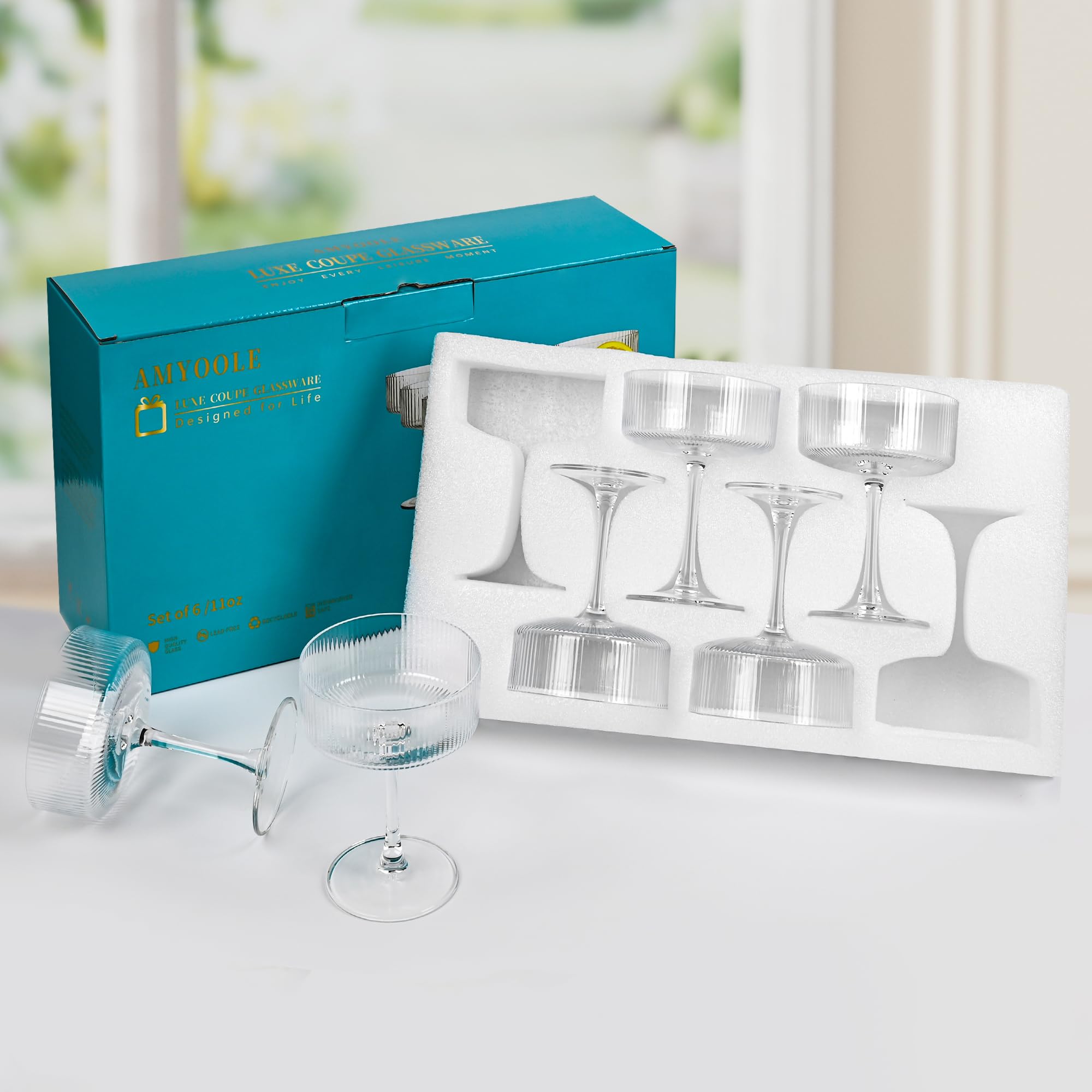 Amyoole box open with pearl cotton liner showing secure packaging and gifting ease