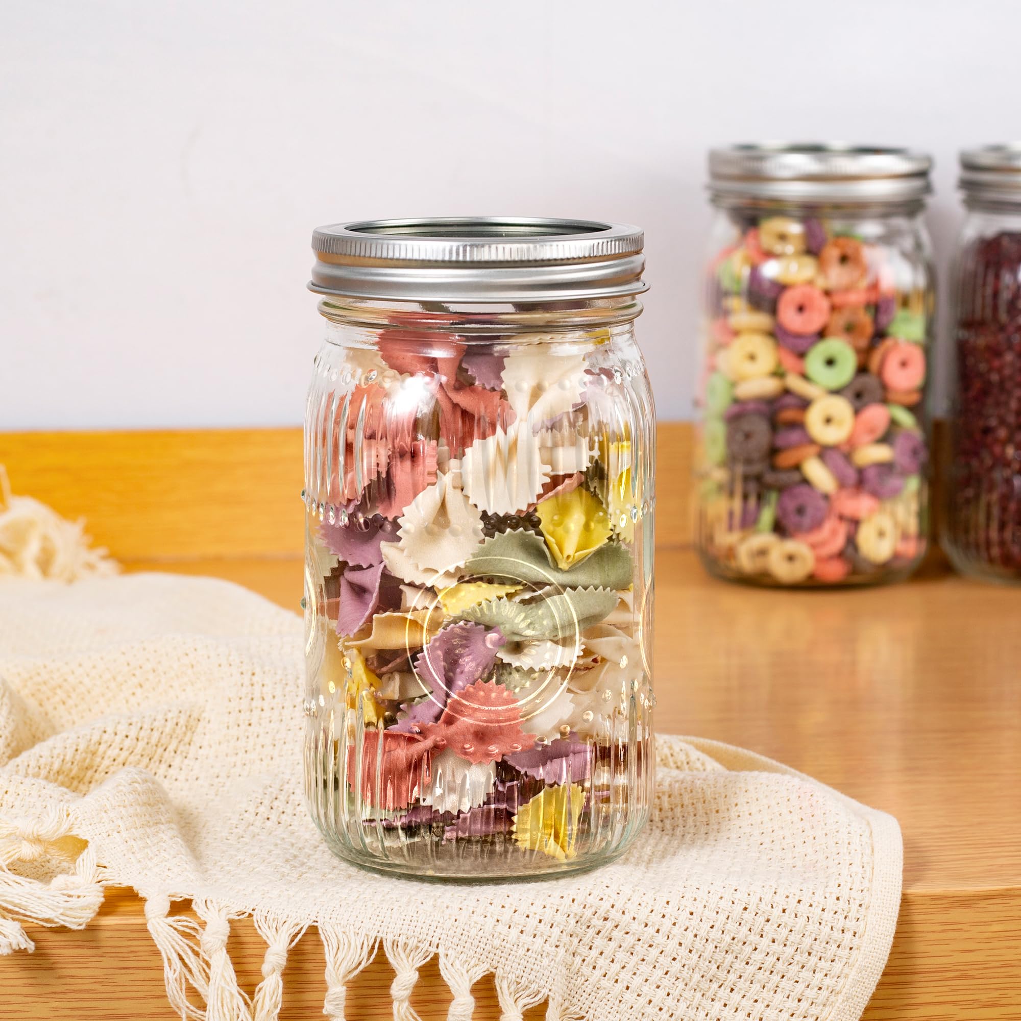 Amzcku jars storing spices and candies, organizes pantry with decorative flair
