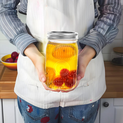 Amzcku jar next to hand for scale, shows true 32oz capacity and easy handling