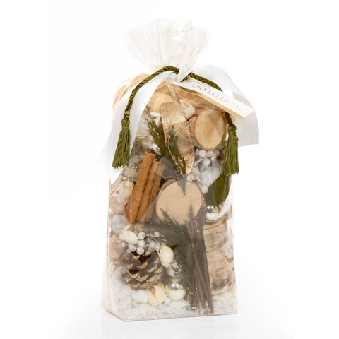 ANDALUCA close-up of juniper and pinecone botanicals highlighting natural texture