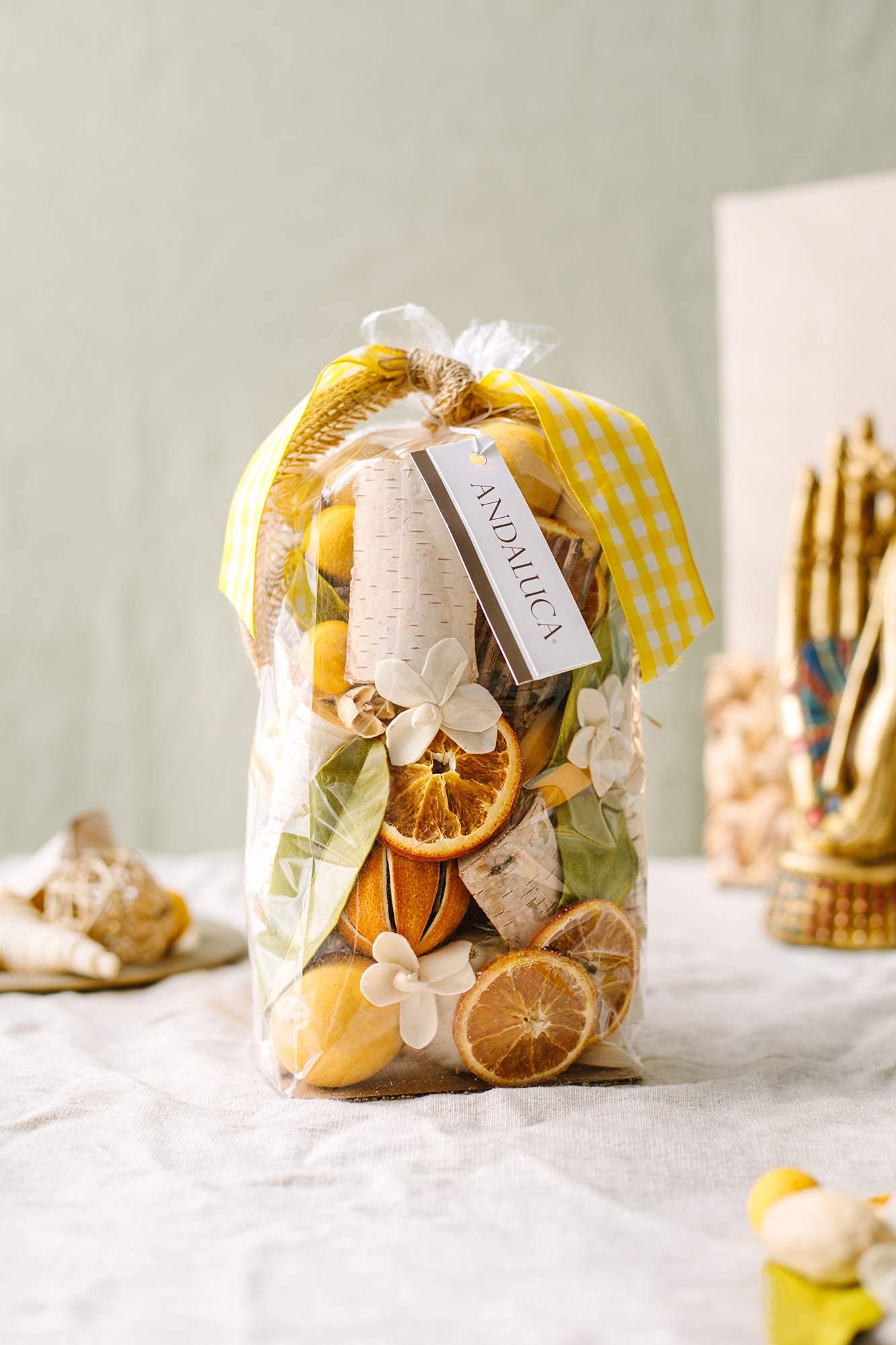 ANDALUCA close-up of yellow botanicals and texture providing vibrant visual and fragrant detail