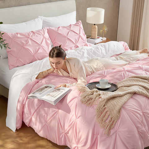 Andency styled bed in a bedroom setting conveying polished, cozy ambiance