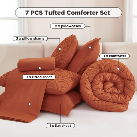 Andency comforter on styled bedroom conveying cozy boho-modern vibe and warmth