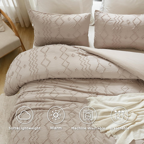 Andency styled bedroom with comforter demonstrating neutral tone that complements décor