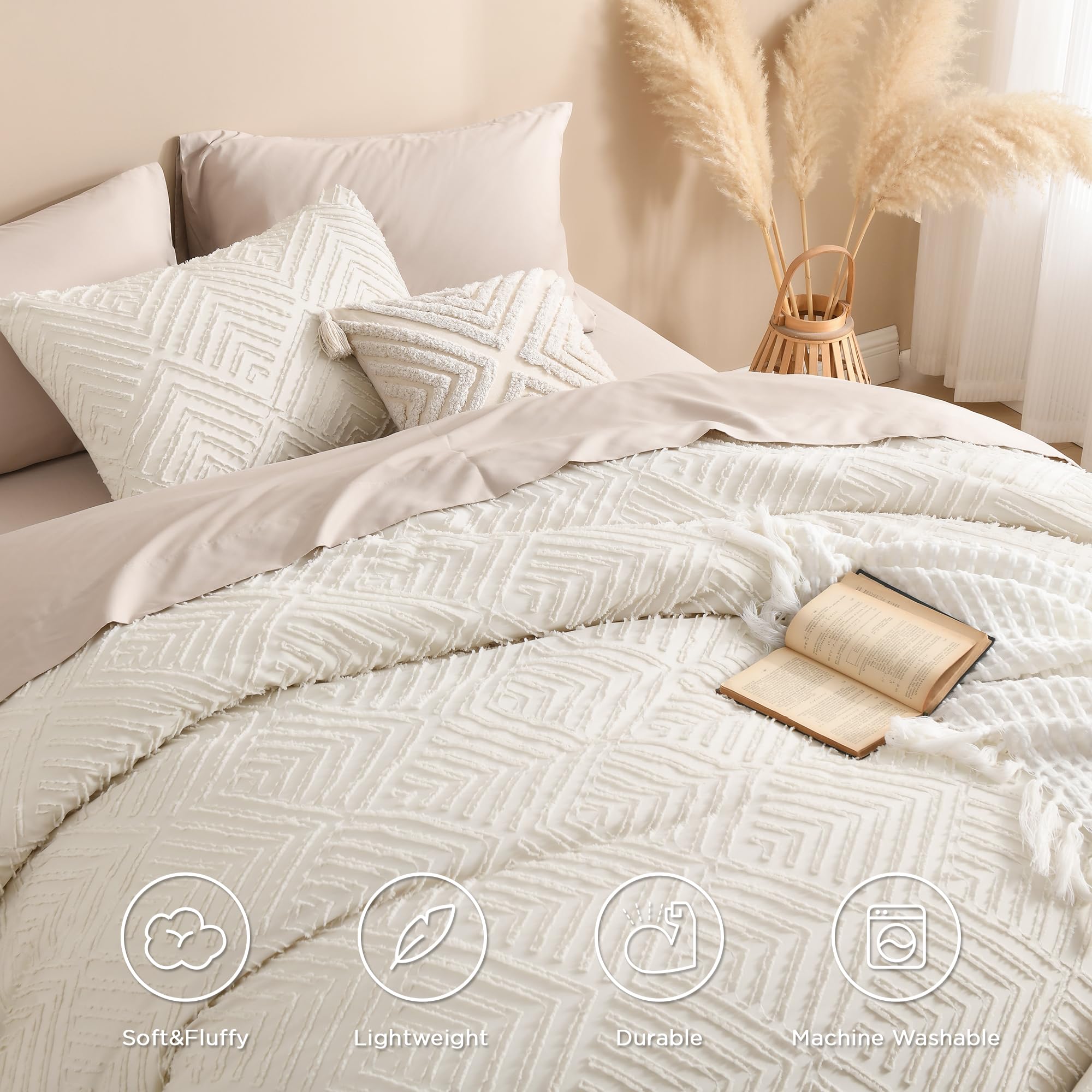 Andency comforter on styled bedroom showing neutral tone and layering benefit