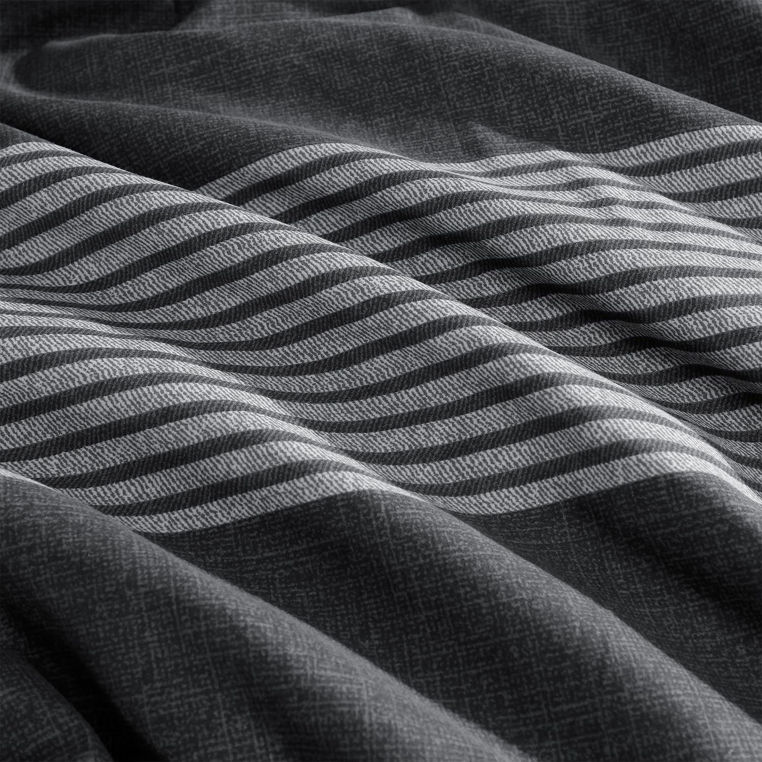 Andency comforter on bed staged to show full-size coverage benefit