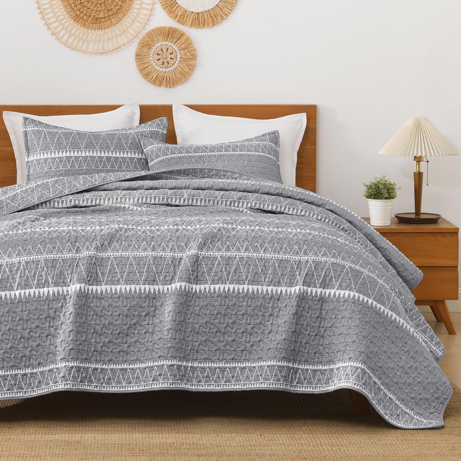 Andency king quilt front view showing grey boho stripes and full bed coverage benefit