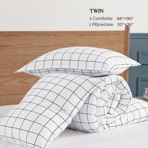 Andency styled bedroom with comforter demonstrating neutral decor versatility