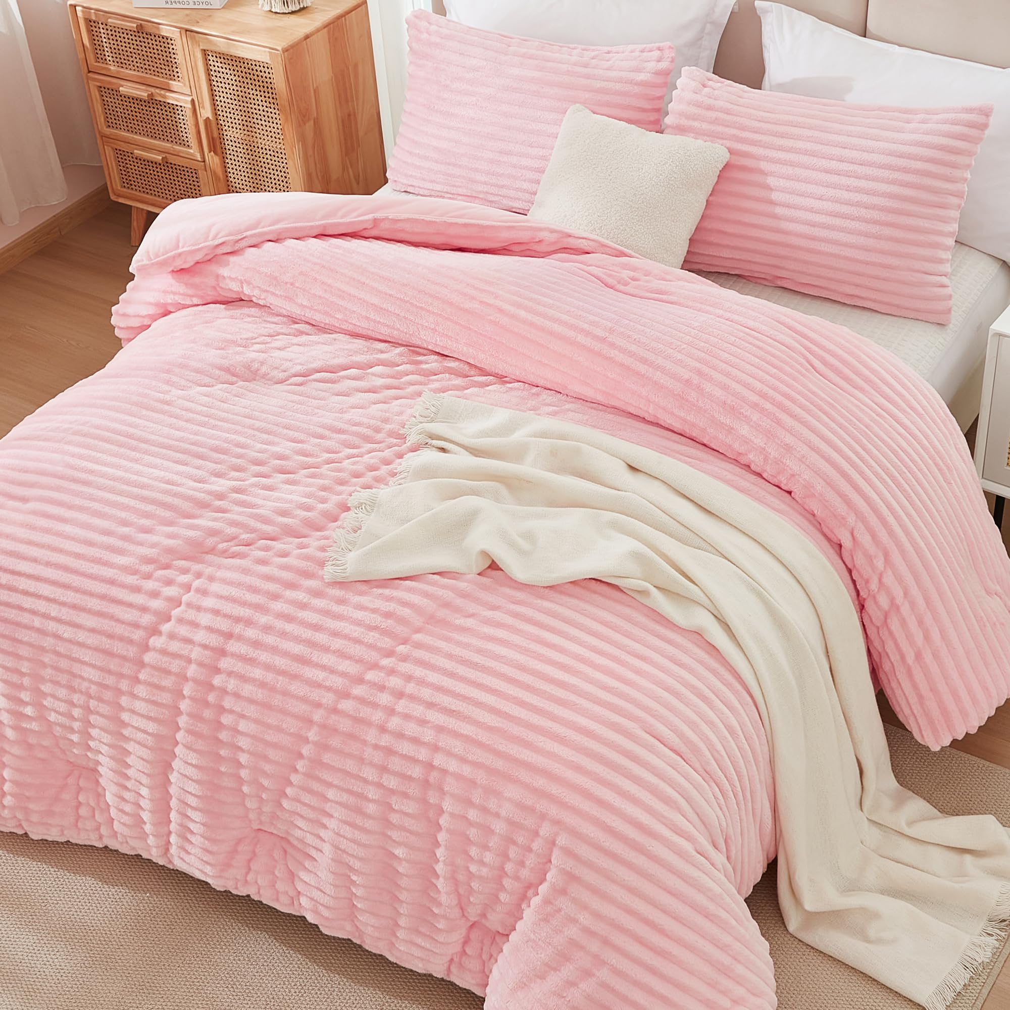 Andency pillowcases beside comforter demonstrating included pieces