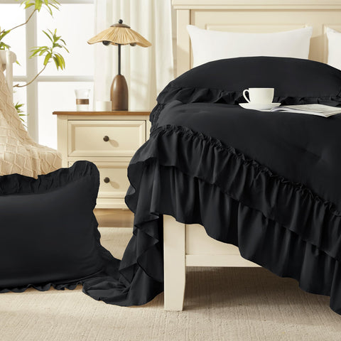 Andency on queen bed showing size and generous side drape