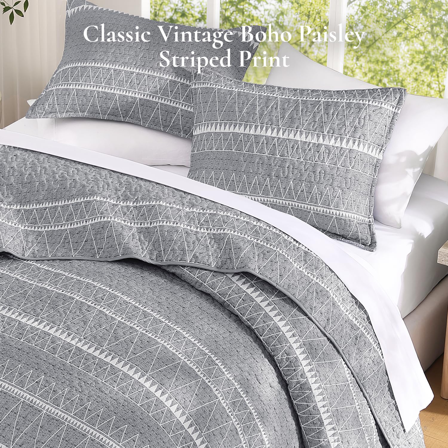 Andency quilt displayed on a styled bedroom showing finished look and cozy appeal