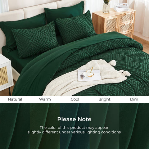 Andency comforter edge shown with hand for scale and generous overhang
