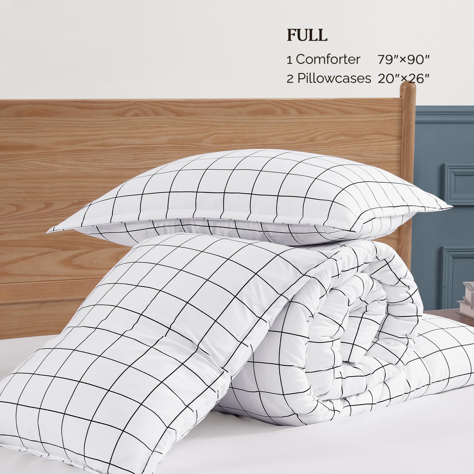 Andency comforter on full bed with scale comparison to illustrate true size