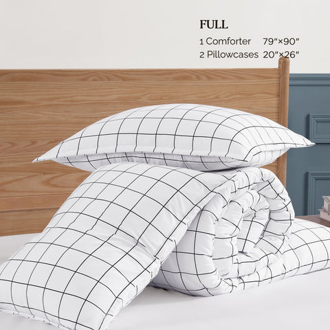 Andency comforter on full bed with scale comparison to illustrate true size