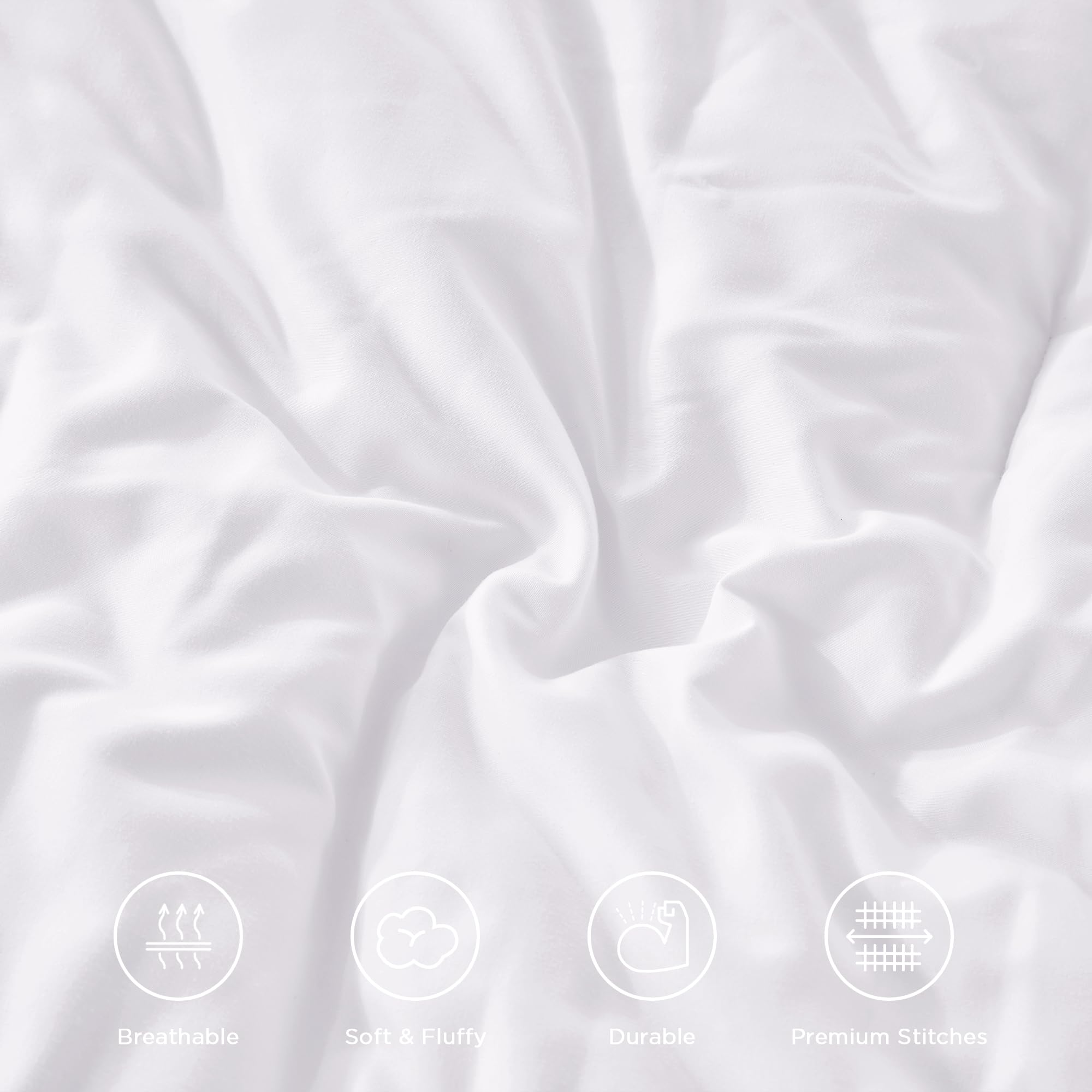 Andency hands fluffing comforter to show loft recovery and cozy lightweight fill