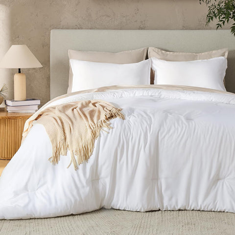 Andency comforter front view showing crisp white finish and clean lines for a polished bed