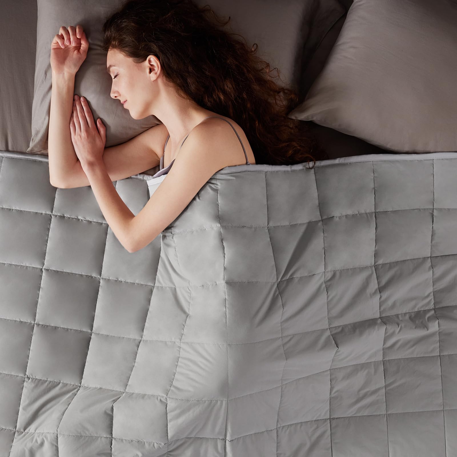 anfie neatly folded blanket showing compact storage and easy portability for guest rooms