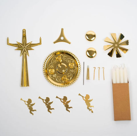 Angel Chimes centerpiece on dining table creating festive atmosphere and glow