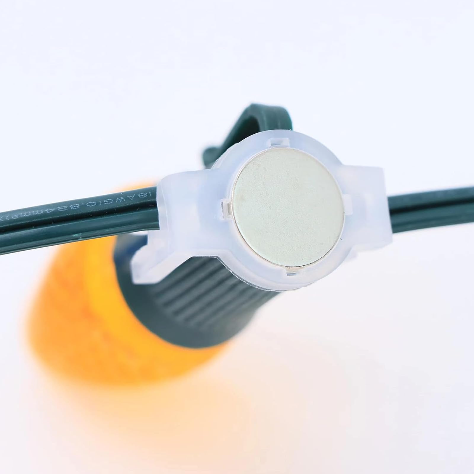Aniai clip securing a C9 bulb demonstrating secure light fit benefit
