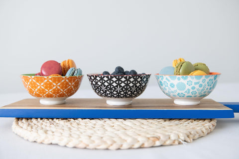 Annovero bowls loaded in dishwasher showing dishwasher-safe durability and bright colors