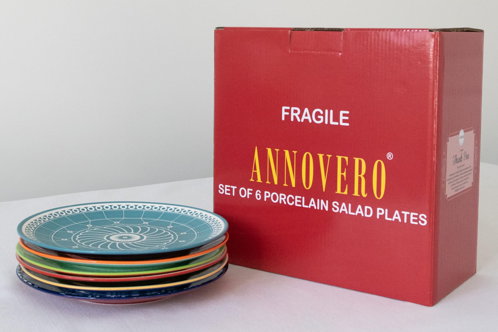 Annovero plates styled on table showing decorative set ideal for entertaining