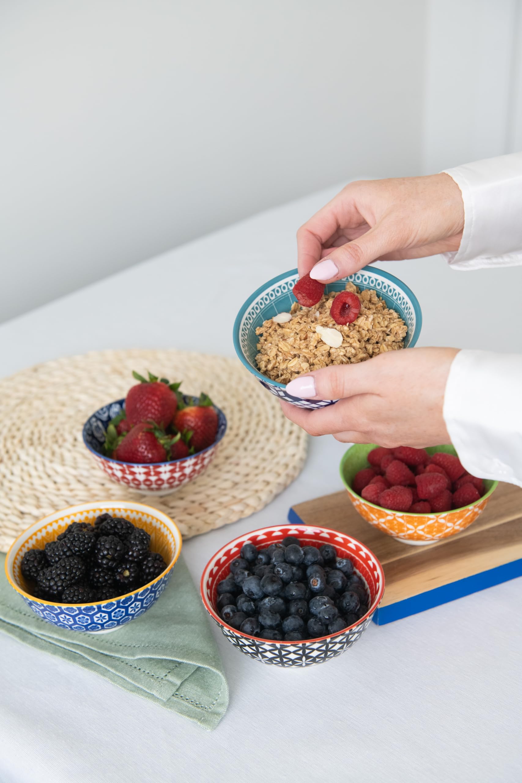Annovero styled on table with linens to display colorful mix-and-match entertaining