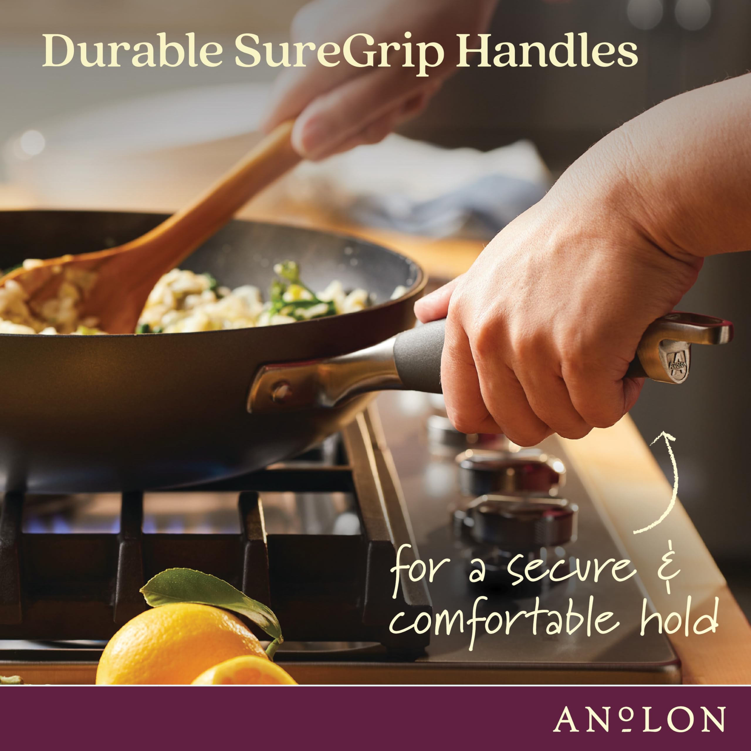 Anolon helper handle close-up showing two-handed lift safety and control