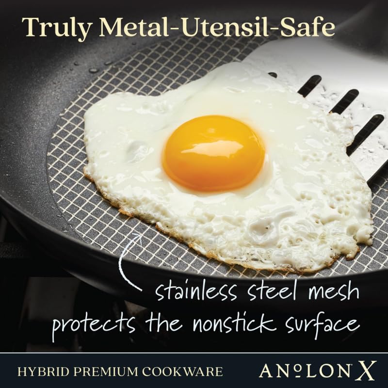Anolon X nonstick pan releasing a perfectly folded omelet for effortless cleanup