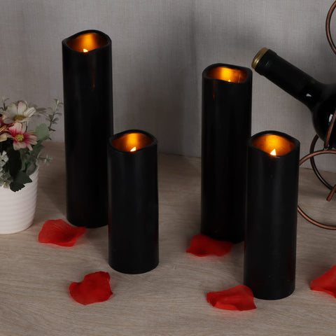 antizer grouped centerpiece styling with mixed heights creating layered ambient light