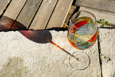 Antoni Barcelona glasses in a styled table setting adding dramatic color and atmosphere