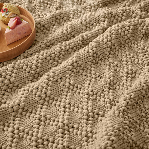 Anysay blanket in use on sofa demonstrating relaxing decor and steady pressure